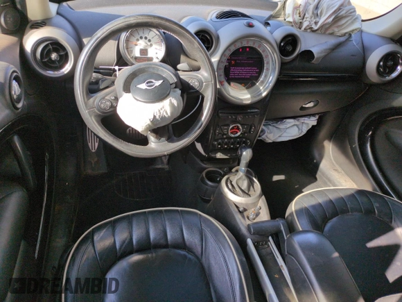 2012 MINI Countryman S with VIN WMWZC5C50CWL63321, listed as a Copart auction lot 52427065 with 126,898 mi miles and Salvage Title. Bid and sale history available at DreamBid. Image 8.