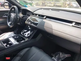 2020 Land Rover Range Rover Velar z VIN SALYM2EV8LA274870, wystawiony jako IAAI lot #42479938 z przebiegiem 43 039 mil mil oraz . Historia ofert i sprzedaży dostępna na DreamBid. Obrazek 5.