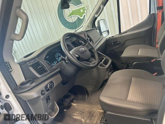 2023 Ford Transit Cargo z VIN 1FTBR1X85PKA75596, wystawiony jako IAAI lot #42742859 z przebiegiem 45 875 mil mil oraz . Historia ofert i sprzedaży dostępna na DreamBid. Obrazek 22.