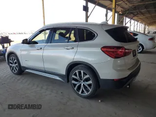 2016 BMW X1 xDrive28i z VIN WBXHT3C35GP881610, wystawiony jako Copart lot #57690625 z przebiegiem 189 579 mil mil oraz Czysty tytuł • Clean title. Historia ofert i sprzedaży dostępna na DreamBid. Obrazek 2.