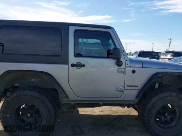 2014 Jeep Wrangler Sport with VIN 1C4AJWAG5EL206565, listed as a IAAI auction lot 42015000 with 90,129 mi miles and . Bid and sale history available at carsss.com. Image 13.