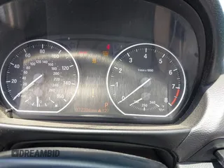 2012 BMW 1 Series 135i with VIN WBAUN7C58CVM26705, listed as a IAAI auction lot 42505448 with 72,336 mi miles and . Bid and sale history available at DreamBid. Image 7.