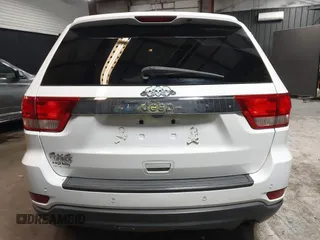 2013 Jeep Grand Cherokee Laredo with VIN 1C4RJFAG9DC532919, listed as a IAAI auction lot 40918828 with 140,093 mi miles. Bid and sale history available at carsss.com. Image 16.