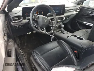 2024 Ford Mustang EcoBoost with VIN 1FA6P8TH6R5127413, listed as a Copart auction lot 49293395 with 14,569 mi miles and Salvage Title. Bid and sale history available at DreamBid. Image 8.