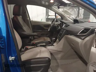 2016 Buick Encore with VIN KL4CJASB5GB601797, listed as a IAAI auction lot 41909757 with 112,814 mi miles. Bid and sale history available at carsss.com. Image 5.