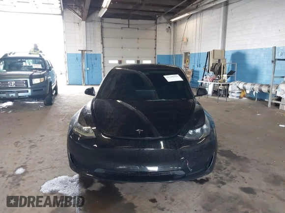 2023 Tesla Model 3 with VIN 5YJ3E1EA5PF396413, listed as a IAAI auction lot 42188639 with 57,717 mi miles and . Bid and sale history available at DreamBid. Image 12.