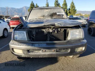1999 Toyota Land Cruiser with VIN JT3HT05J3X0026246, listed as a Copart auction lot 81826974 with 0 mi miles and Salvage Title. Bid and sale history available at carsss.com. Image 5.