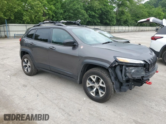 2014 Jeep Cherokee Trailhawk z VIN 1C4PJMBS9EW159721, wystawiony jako Copart lot #60719525 z przebiegiem 136 807 mil mil oraz Szkoda całkowita • Salvage title. Historia ofert i sprzedaży dostępna na DreamBid. Obrazek 4.
