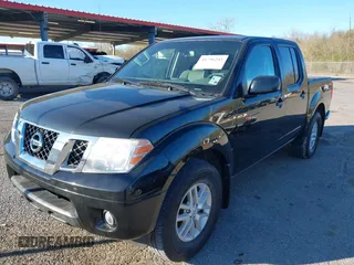 2020 Nissan Frontier SV with VIN 1N6ED0EA6LN723691, listed as a IAAI auction lot 41796243 with 36,504 mi miles and . Bid and sale history available at DreamBid. Image 2.
