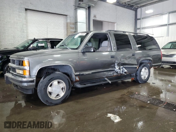 1999 Chevrolet Suburban with VIN 3GNFK16R8XG149091, listed as a Copart auction lot 71300024 with 254,044 mi miles and Salvage Title. Bid and sale history available at carsss.com. Image 1.