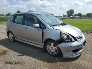 2007 Honda Fit Sport with VIN JHMGD38687S067648, listed as a Copart auction lot 64657345 with 123,055 mi miles and Salvage title. Bid and sale history available at DreamBid. Image 4.