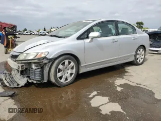 2011 Honda Civic LX with VIN 2HGFA1F59BH309708, listed as a Copart auction lot 53485515 with 215,954 mi miles and Salvage Title. Bid and sale history available at DreamBid. Image 1.