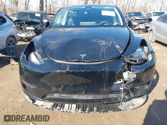 2024 Tesla Model Y with VIN 7SAYGDED5RF093018, listed as a IAAI auction lot 41747467 with 60,469 mi miles and . Bid and sale history available at DreamBid. Image 12.