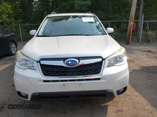 2015 Subaru Forester Touring with VIN JF2SJAWC9FH573973, listed as a IAAI auction lot 42380080 with 87,938 mi miles and . Bid and sale history available at DreamBid. Image 12.
