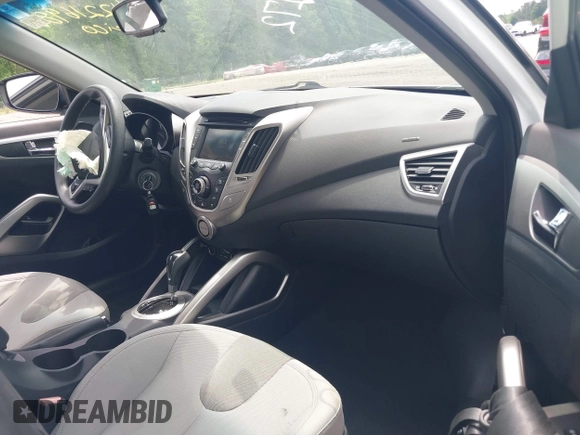 2012 Hyundai Veloster w/Gray Int с VIN KMHTC6AD6CU026944, выставлен на аукционе IAAI как лот 42216988 с пробегом 61 147 миль миль и . История ставок и продаж доступна на DreamBid. Изображение 5.
