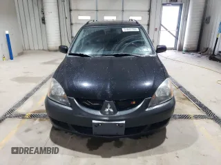 2004 Mitsubishi Lancer z VIN JA3AD29F44U024617, wystawiony jako Copart lot #51847765 z przebiegiem 172 585 mil mil oraz Szkoda całkowita • Salvage title. Historia ofert i sprzedaży dostępna na DreamBid. Obrazek 5.