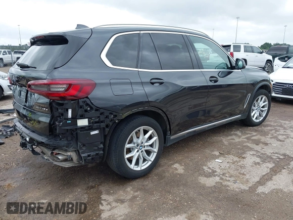 2021 BMW X5 xDrive45e with VIN 5UXTA6C02M9F88978, listed as a IAAI auction lot 42201563 with 23,339 mi miles and . Bid and sale history available at DreamBid. Image 4.