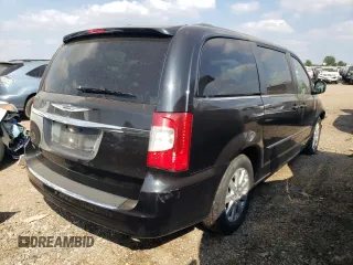 2014 Chrysler Town & Country Touring with VIN 2C4RC1BG2ER440037, listed as a Copart auction lot 69394284 with 125,978 mi miles and Salvage Title. Bid and sale history available at DreamBid. Image 3.