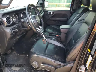 2020 Jeep Wrangler Unlimited Sahara with VIN 1C4HJXEG0LW301545, listed as a Copart auction lot 59279085 with 94,890 mi miles and Salvage title. Bid and sale history available at DreamBid. Image 7.