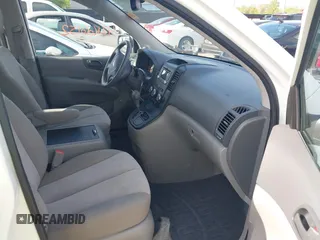 2014 Kia Sedona LX with VIN KNDMG4C75E6545483, listed as a IAAI auction lot 42166152 with 121,827 mi miles and . Bid and sale history available at carsss.com. Image 5.