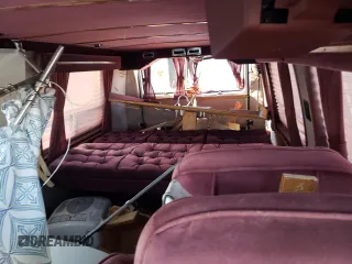 1990 Chevrolet Chevy Van z VIN 2GBEG25KXL4156338, wystawiony jako Copart lot #73499394 z przebiegiem 113 455 mil mil oraz Szkoda całkowita • Salvage title. Historia ofert i sprzedaży dostępna na DreamBid. Obrazek 10.