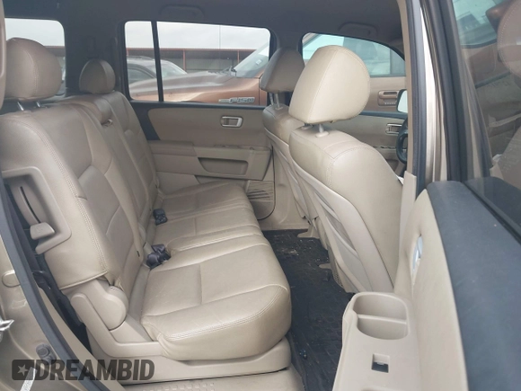 2011 Honda Pilot LX with VIN 5FNYF3H2XBB045721, listed as a IAAI auction lot 42791364 with 149,258 mi miles and . Bid and sale history available at DreamBid. Image 8.