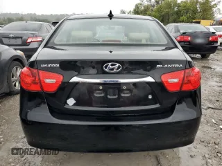 2010 Hyundai Elantra GLS with VIN KMHDU4AD6AU930974, listed as a Copart auction lot 73050024 with 76,430 mi miles and Salvage title. Bid and sale history available at DreamBid. Image 6.
