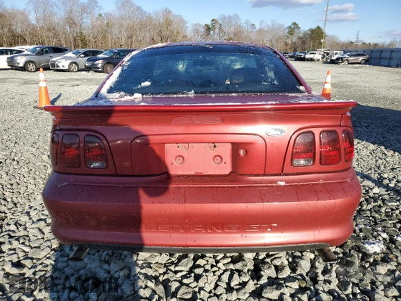 1996 Ford Mustang GT z VIN 1FALP42X0TF168223, wystawiony jako Copart lot #46351085 z przebiegiem 121 657 mil mil oraz Szkoda całkowita • Salvage title. Historia ofert i sprzedaży dostępna na DreamBid. Obrazek 6.