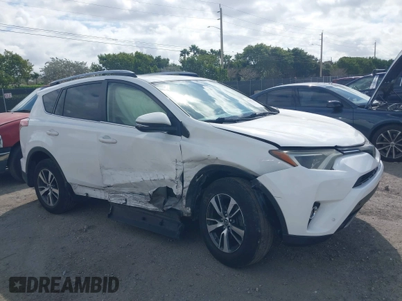 2018 Toyota RAV4 XLE with VIN JTMWFREV7JJ731893, listed as a IAAI auction lot 41567850 with 141,269 mi miles. Bid and sale history available at carsss.com. Image 6.