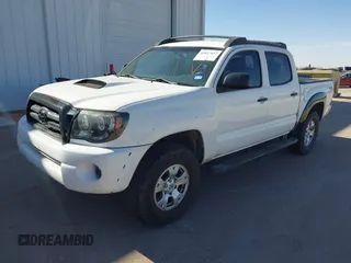 2011 Toyota Tacoma PreRunner with VIN 3TMJU4GN8BM111705, listed as a IAAI auction lot 41817612 with 212,334 mi miles and . Bid and sale history available at DreamBid. Image 2.
