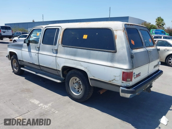 1990 GMC Suburban with VIN 1GKGR26NXLF528203, listed as a IAAI auction lot 42731684 with 185,736 mi miles and . Bid and sale history available at DreamBid. Image 3.