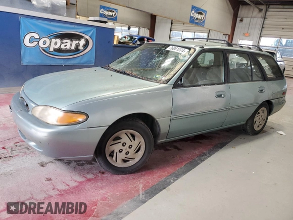 1997 Ford Escort LX z VIN 3FALP15P9VR107467, wystawiony jako Copart lot #76061074 z przebiegiem 69 873 mil mil oraz Czysty tytuł • Clean title. Historia ofert i sprzedaży dostępna na DreamBid. Obrazek 1.