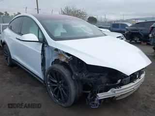 2023 Tesla Model X with VIN 7SAXCBE54PF384403, listed as a IAAI auction lot 40947187 with 16,881 mi miles and . Bid and sale history available at DreamBid. Image 1.