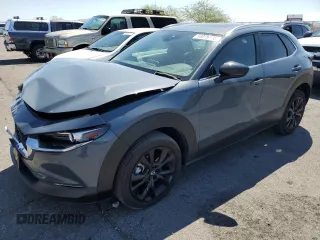 2023 Mazda CX-30 S Carbon Edition z VIN 3MVDMBCM0PM542768, wystawiony jako Copart lot #56075175 z przebiegiem 24 419 mil mil oraz Szkoda całkowita • Salvage title. Historia ofert i sprzedaży dostępna na DreamBid. Obrazek 1.
