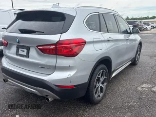 2018 BMW X1 sDrive28i with VIN WBXHU7C38J5L08773, listed as a Copart auction lot 55470955 with 149,885 mi miles and Clean Title. Bid and sale history available at DreamBid. Image 4.