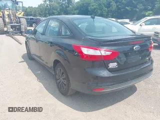 2012 Ford Focus SE with VIN 1FAHP3F22CL249739, listed as a IAAI auction lot 42756865 with 172,047 mi miles and . Bid and sale history available at DreamBid. Image 3.