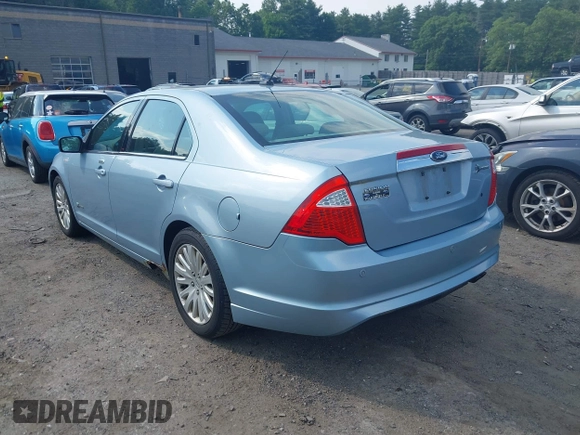 2010 Ford Fusion Hybrid z VIN 3FADP0L35AR279780, wystawiony jako IAAI lot #42480146 z przebiegiem 148 080 mil mil oraz . Historia ofert i sprzedaży dostępna na DreamBid. Obrazek 3.