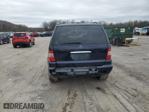 2002 Mercedes-Benz M-Class with VIN 4JGAB75E12A316799, listed as a Copart auction lot 51970785 with 176,915 mi miles and Salvage Title. Bid and sale history available at carsss.com. Image 6.