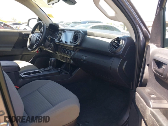 2020 Toyota Tacoma SR with VIN 3TYRX5GN4LT003040, listed as a IAAI auction lot 42121503 with 49,858 mi miles and . Bid and sale history available at DreamBid. Image 5.