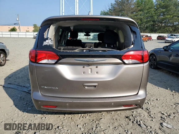 2017 Chrysler Pacifica Touring with VIN 2C4RC1DG1HR536856, listed as a Copart auction lot 58973155 with 142,520 mi miles and Salvage title. Bid and sale history available at DreamBid. Image 6.