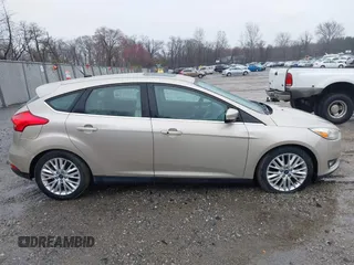 2017 Ford Focus Titanium with VIN 1FADP3N26HL207100, listed as a IAAI auction lot 41865961 with 220,850 mi miles and . Bid and sale history available at carsss.com. Image 13.