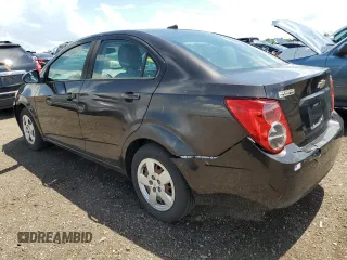 2014 Chevrolet Sonic LS with VIN 1G1JA5SH1E4241785, listed as a Copart auction lot 61914455 with 95,014 mi miles and Clean title. Bid and sale history available at DreamBid. Image 2.