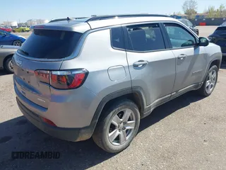 2022 Jeep Compass Latitude with VIN 3C4NJDBB0NT230866, listed as a IAAI auction lot 41979792 with 53,146 mi miles and . Bid and sale history available at DreamBid. Image 4.