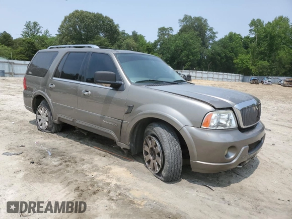 2004 Lincoln Navigator Luxury with VIN 5LMFU28R74LJ09128, listed as a Copart auction lot 59023625 with 181,658 mi miles and Salvage title. Bid and sale history available at DreamBid. Image 4.