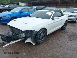 2018 Ford Mustang EcoBoost Premium z VIN 1FATP8UH9J5109820, wystawiony jako IAAI lot #42364587 z przebiegiem 118 640 mil mil oraz . Historia ofert i sprzedaży dostępna na DreamBid. Obrazek 2.