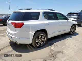 2017 GMC Acadia Denali with VIN 1GKKNPLS8HZ327113, listed as a Copart auction lot 58431595 with 102,061 mi miles and Salvage title. Bid and sale history available at DreamBid. Image 3.