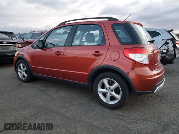 2009 Suzuki SX4 Man AWD with VIN JS2YB413696201043, listed as a Copart auction lot 86283064 with 153,286 mi miles and Salvage Title. Bid and sale history available at carsss.com. Image 2.