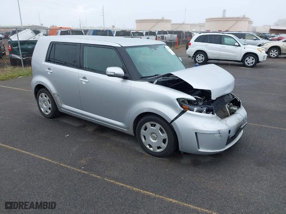 2008 Scion xB with VIN JTLKE50EX81011066, listed as a IAAI auction lot 41573980 with 154974 miles. Bid and sale history available at carsss.com. Image 1.
