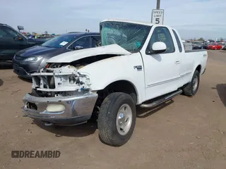 1998 Ford F-150 with VIN 1FTRX18L4WKA19929, listed as a IAAI auction lot 41573331 with 337,558 mi miles and . Bid and sale history available at DreamBid. Image 16.