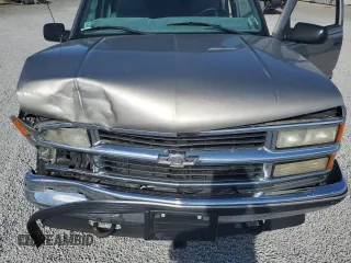 1999 Chevrolet Suburban with VIN 1GNFK16R6XJ492206, listed as a Copart auction lot 71728594 with 129,871 mi miles and Salvage Title. Bid and sale history available at carsss.com. Image 12.